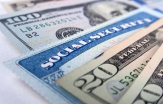 Social security card and American money dollar bills stock photo_0